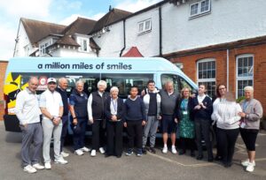 staff and students with new mini bus